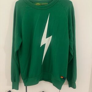 Green Sweater with Lightning Bolt Design